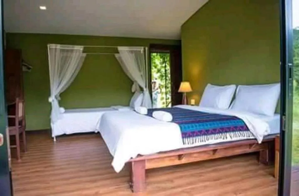 Bed in Le Bassin Erawan Resort