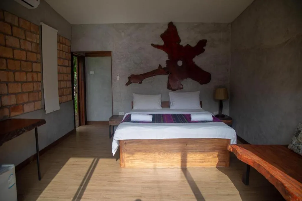 Bed in Le Bassin Erawan Resort