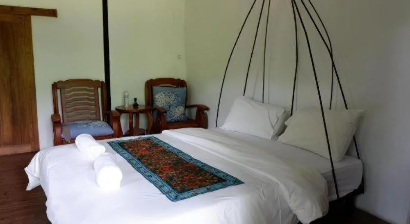 Bed in Le Bassin Erawan Resort