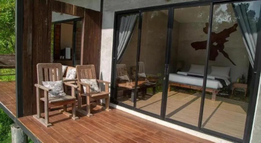 Bed in Le Bassin Erawan Resort