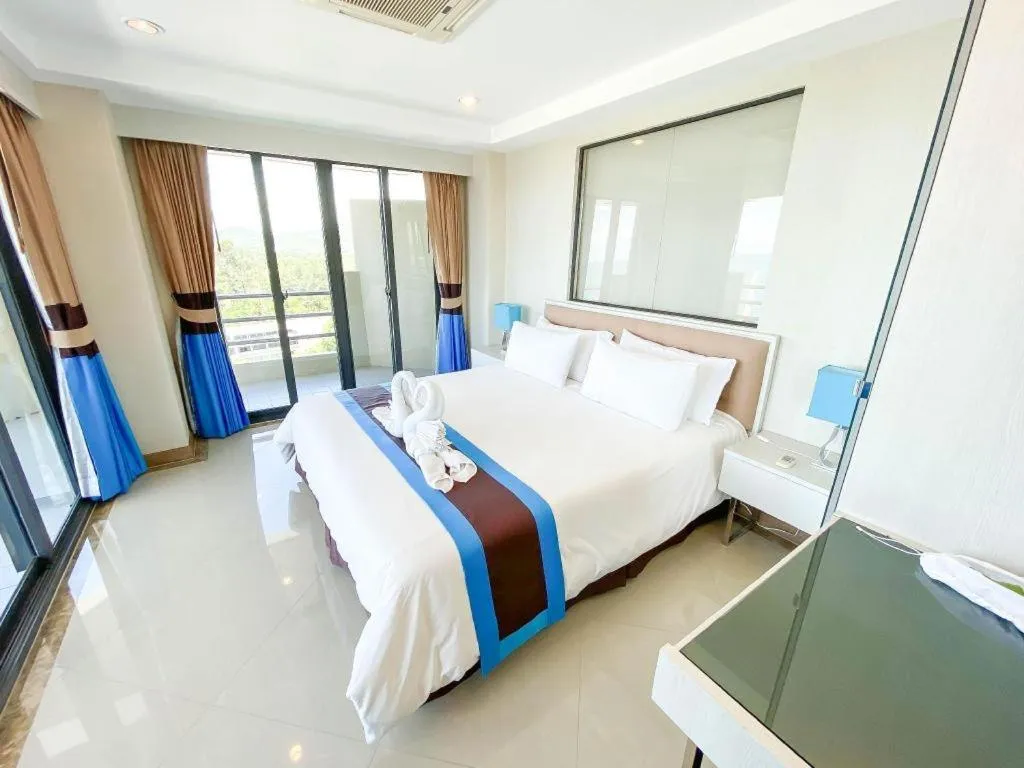 Bed in Blue Wave Hotel Hua Hin
