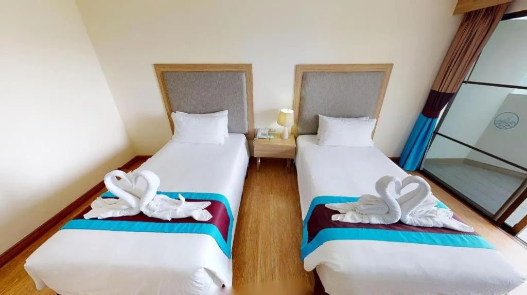 Bed in Blue Wave Hotel Hua Hin