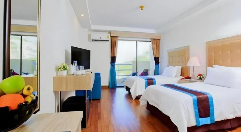 Bed in Blue Wave Hotel Hua Hin