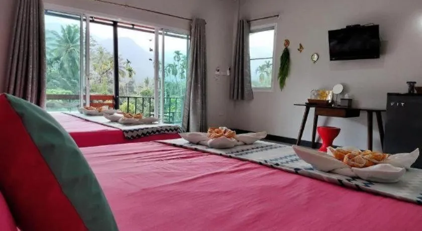 Bed in Baan Bhuriwat Kiriwong