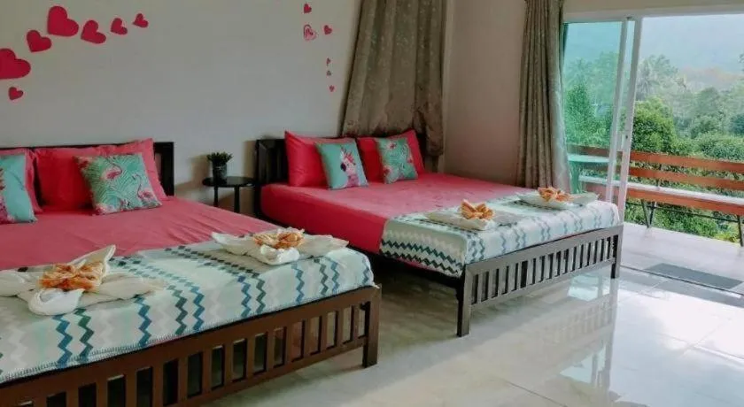 Bed in Baan Bhuriwat Kiriwong