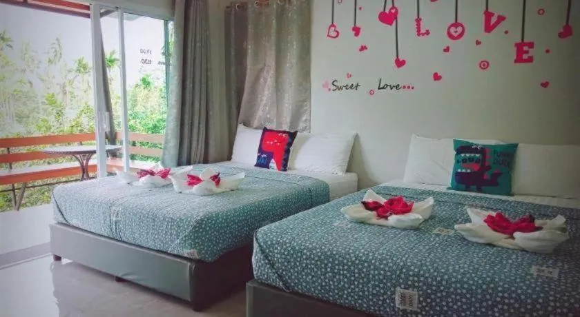 Bed in Baan Bhuriwat Kiriwong