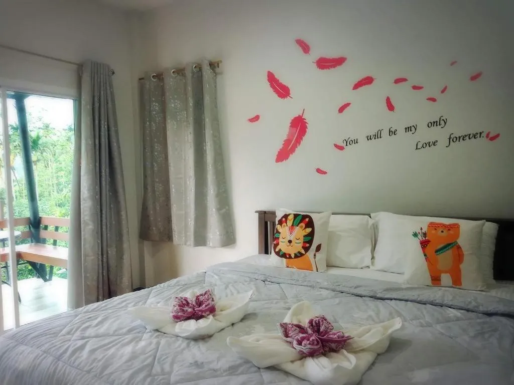 Bed in Baan Bhuriwat Kiriwong