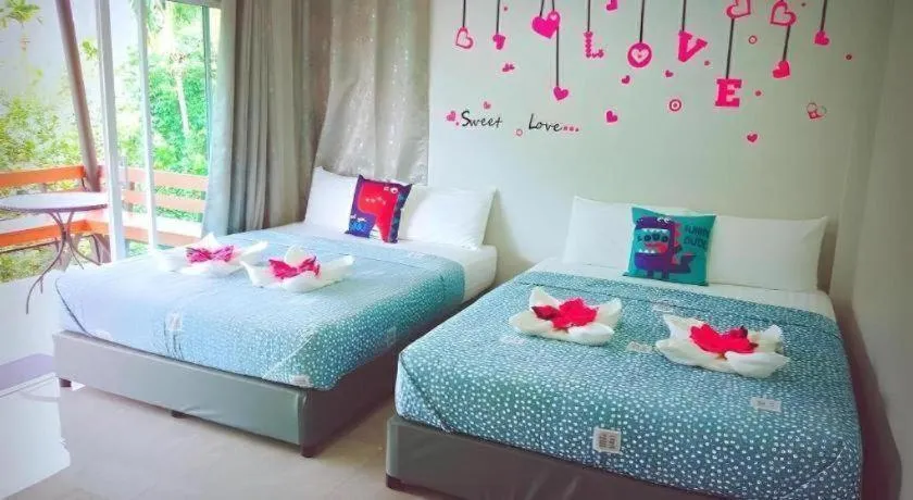 Bed in Baan Bhuriwat Kiriwong