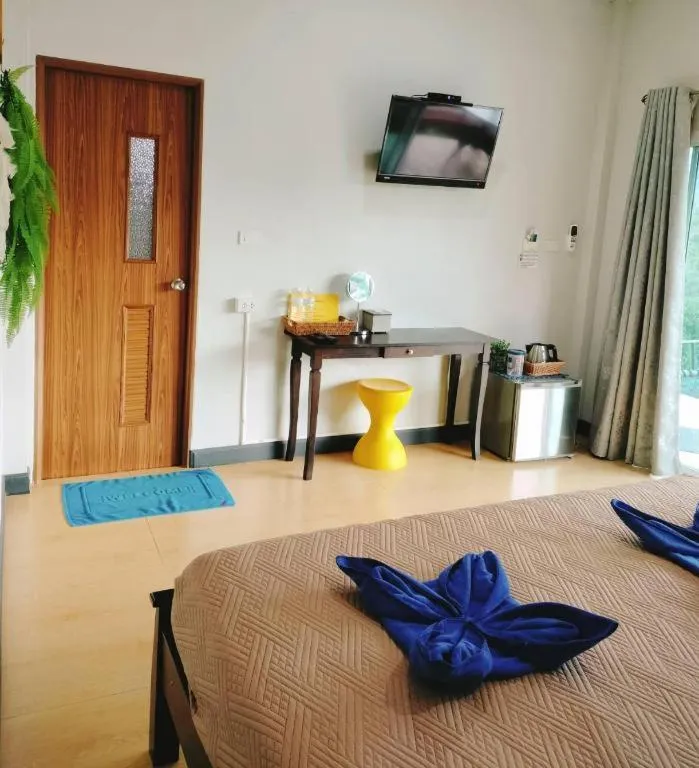 Bed in Baan Bhuriwat Kiriwong