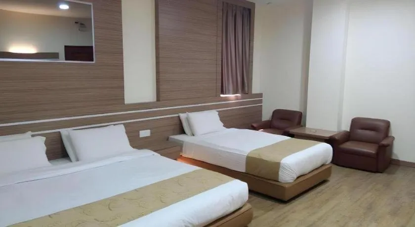 Bed in Holiday Hotel Batam