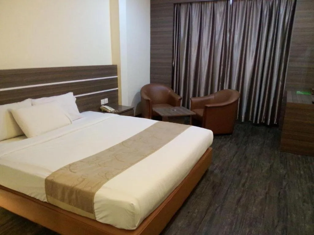 Bed in Holiday Hotel Batam