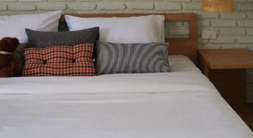 Bed in Yellow Moon Hotel