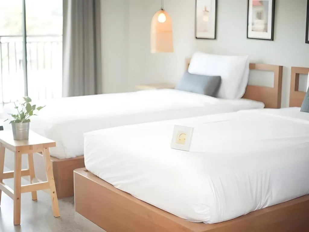 Bed in Yellow Moon Hotel