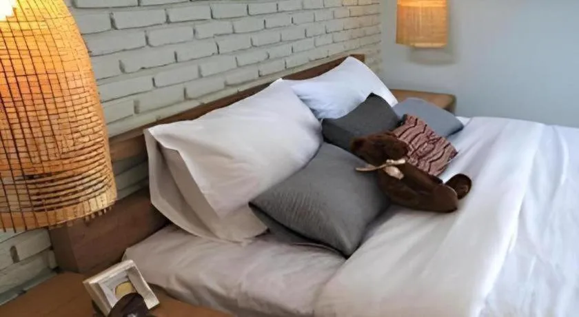 Bed in Yellow Moon Hotel