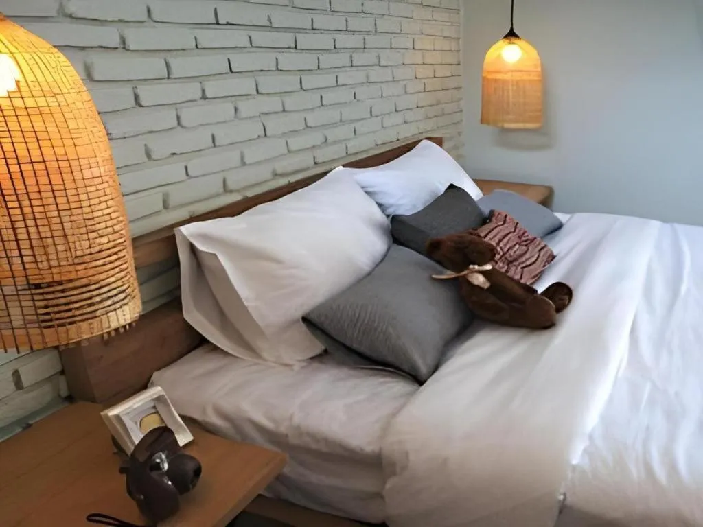 Bed in Yellow Moon Hotel