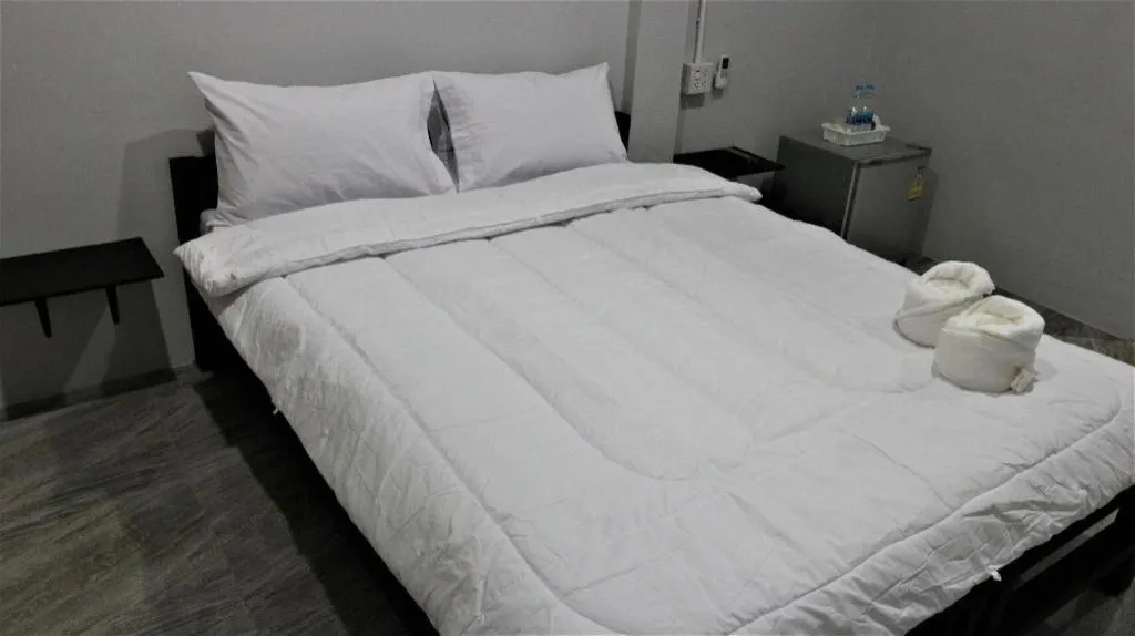Bed in Narisara Korat Resort