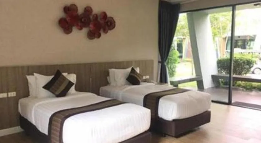 Bed in Chatnipa Beach Resort