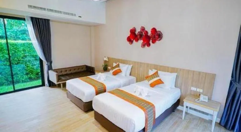 Bed in Chatnipa Beach Resort