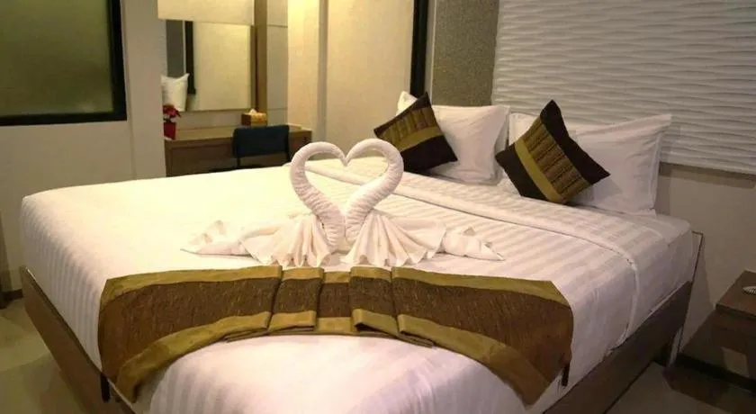 Bed in Chatnipa Beach Resort