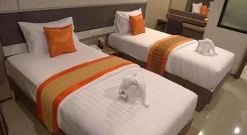 Bed in Chatnipa Beach Resort