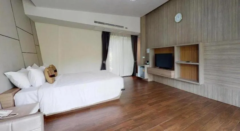 Bed in Chatnipa Beach Resort