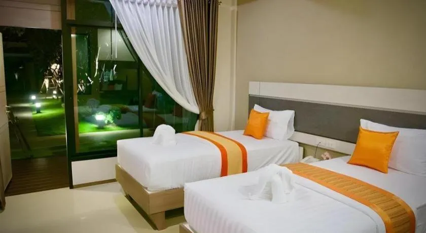 Bed in Chatnipa Beach Resort
