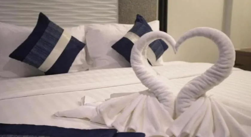 Bed in Chatnipa Beach Resort