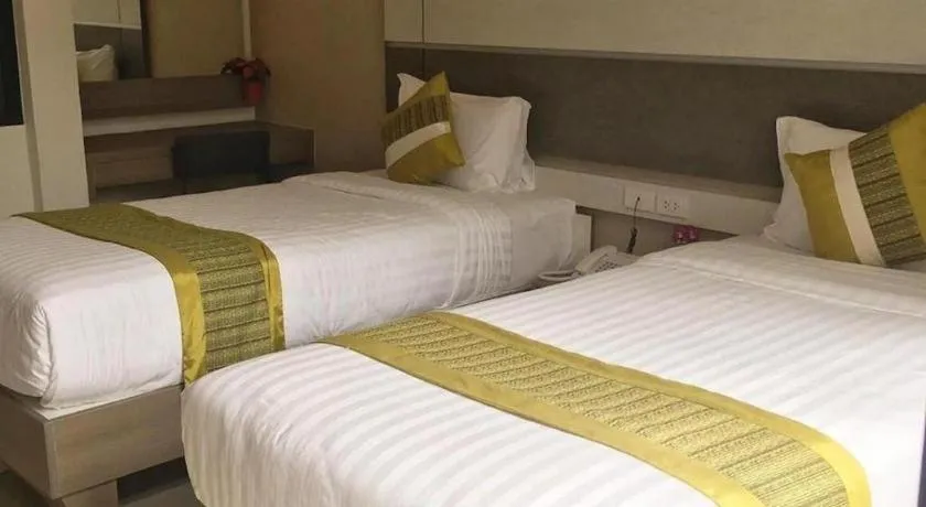 Bed in Chatnipa Beach Resort