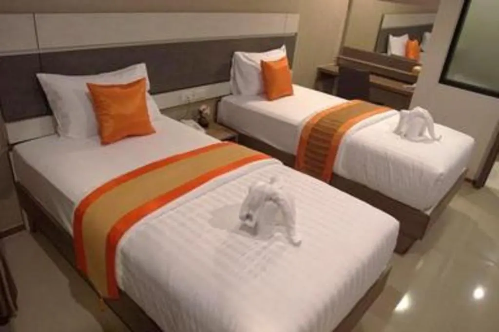 Bed in Chatnipa Beach Resort