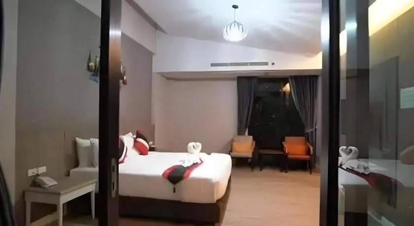 Bed in Chatnipa Beach Resort