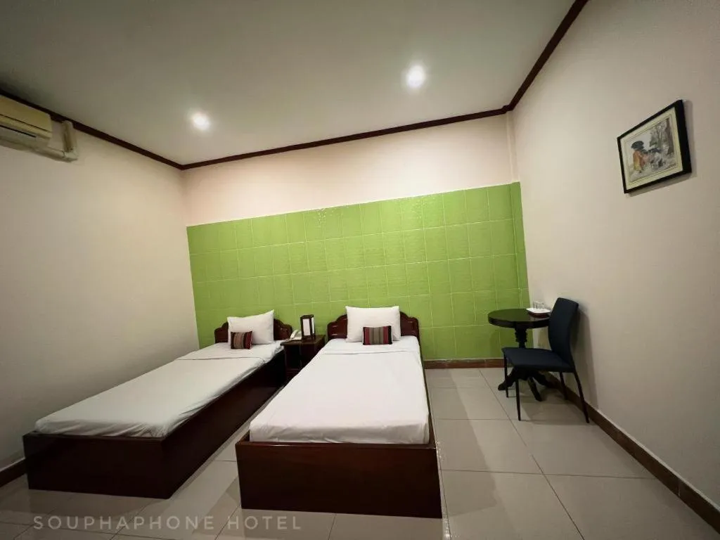 Bed in Souphaphone Hotel