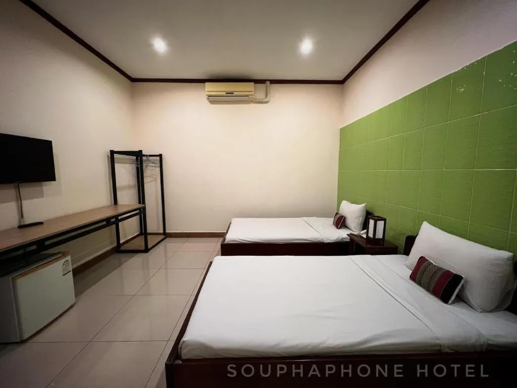 Bed in Souphaphone Hotel