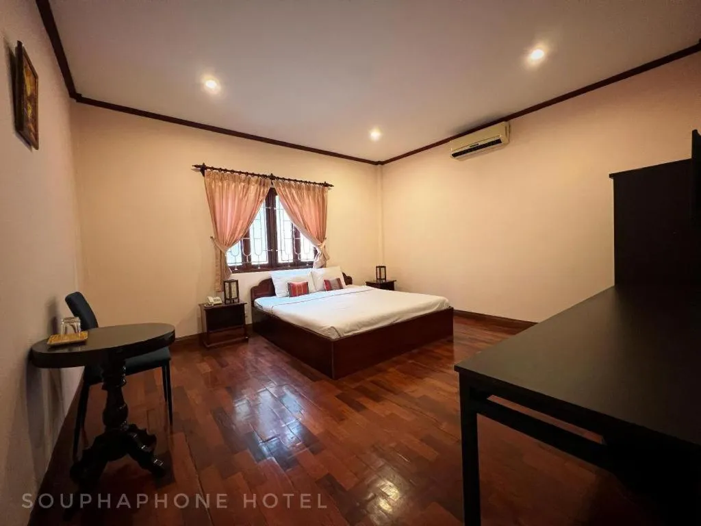 Bed in Souphaphone Hotel