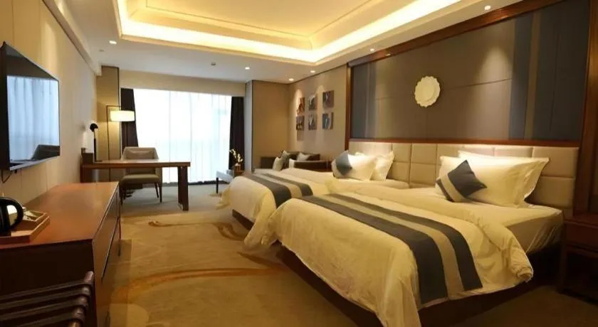 Bed in Metropolo Hotel Chengdu Wuhou Wanda Plaza