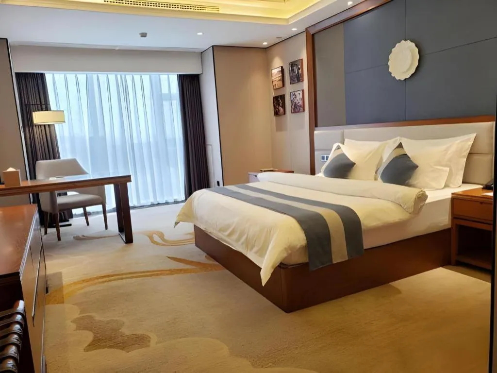 Bed in Metropolo Hotel Chengdu Wuhou Wanda Plaza