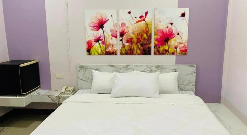 Bed in Sweet Hug Hotel