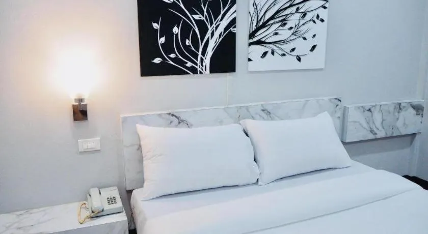 Bed in Sweet Hug Hotel