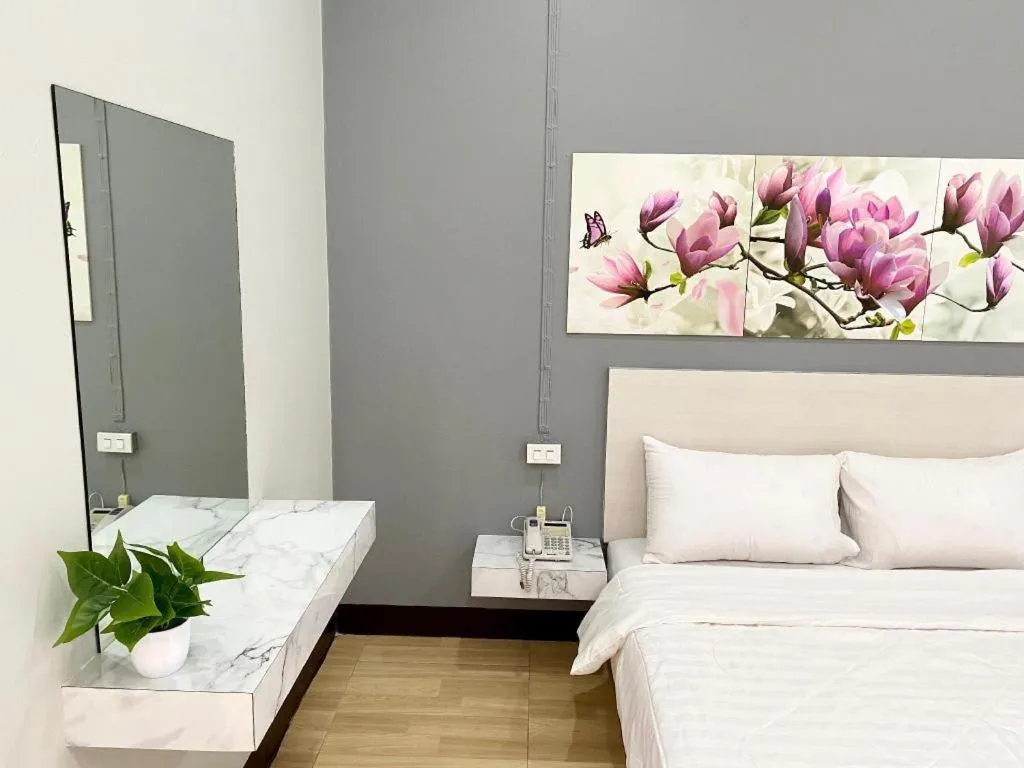 Bed in Sweet Hug Hotel