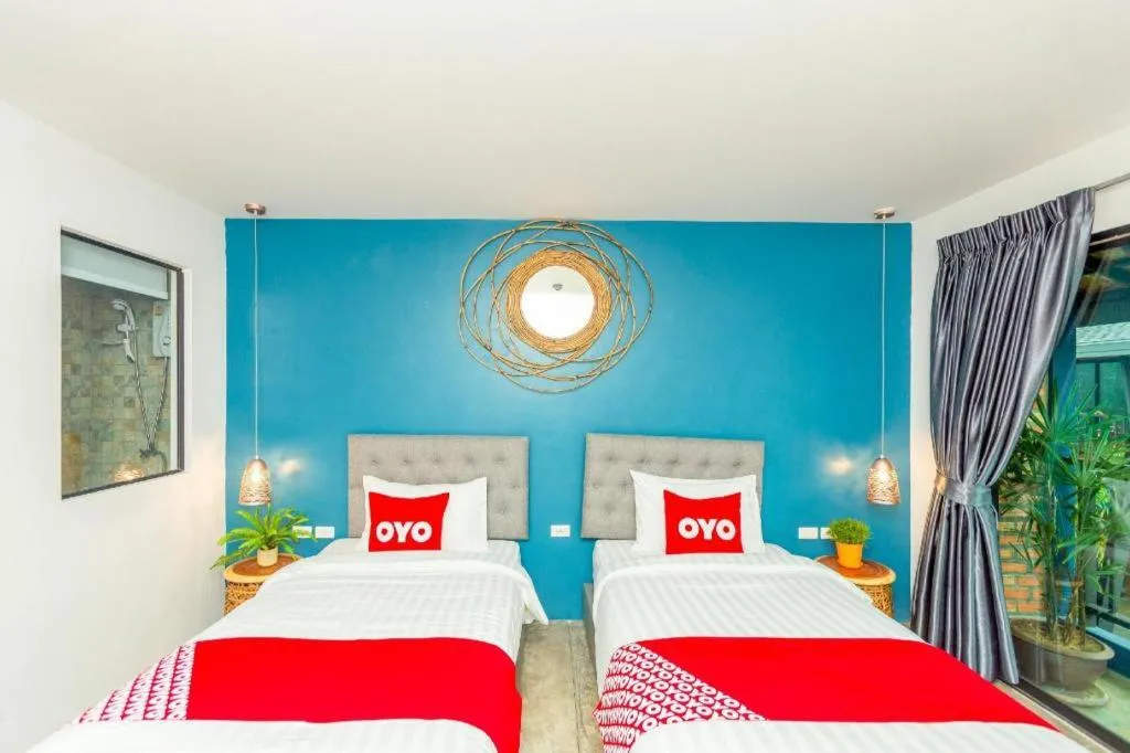 Bed in OYO 422 Jane Homestay and Resort