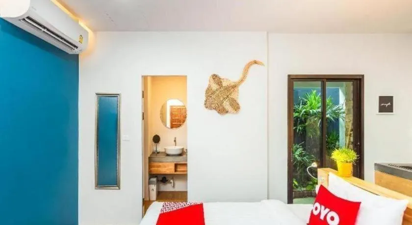 Bed in OYO 422 Jane Homestay and Resort