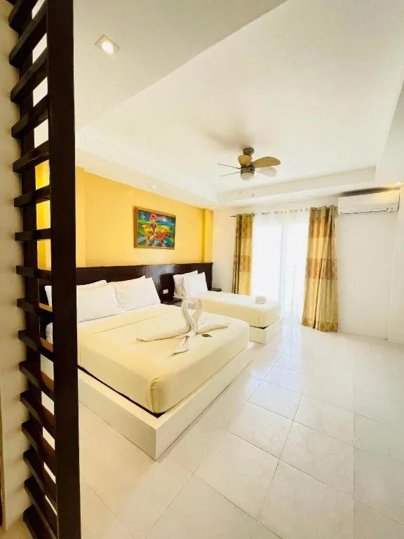 Bed in Alice in Wonderland Beach Hotel