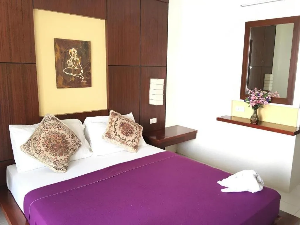 Bed in Alice in Wonderland Beach Hotel