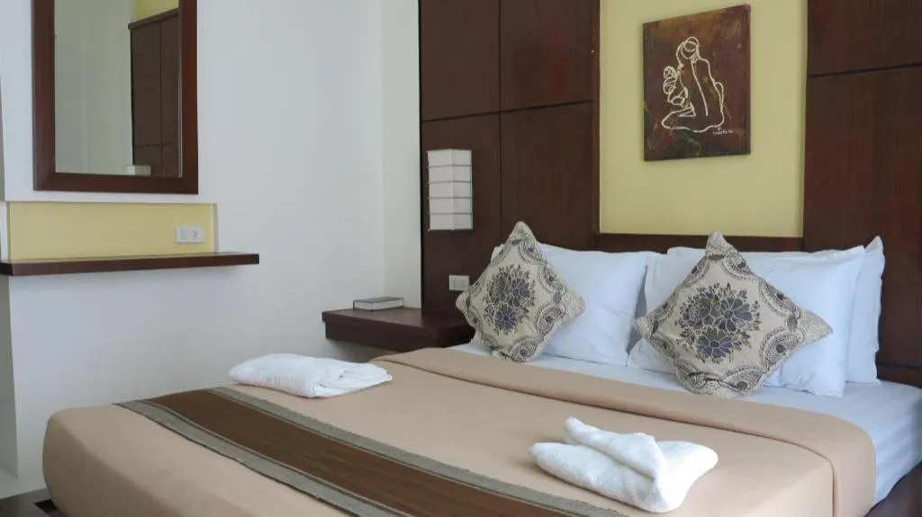 Bed in Alice in Wonderland Beach Hotel