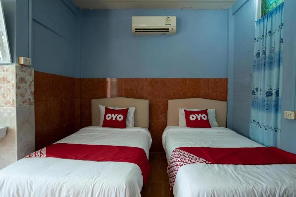 Bed in Raknatee Resort