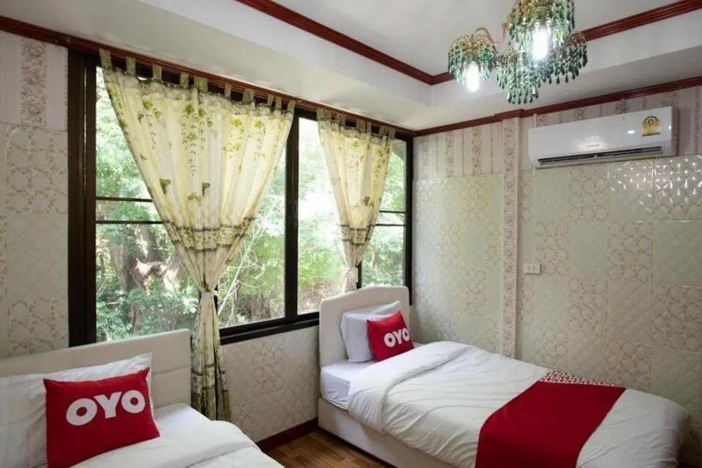 Bed in Raknatee Resort