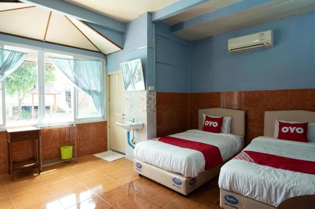 Bed in Raknatee Resort