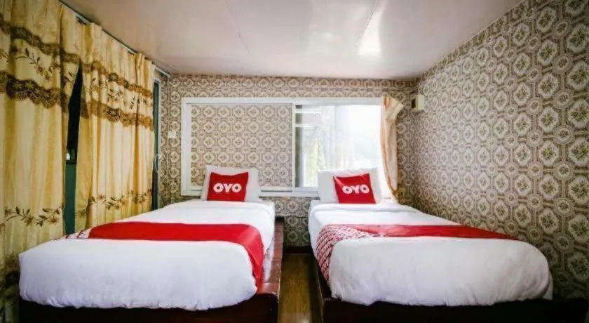 Bed in Raknatee Resort