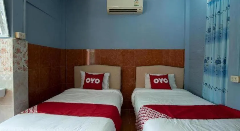 Bed in Raknatee Resort