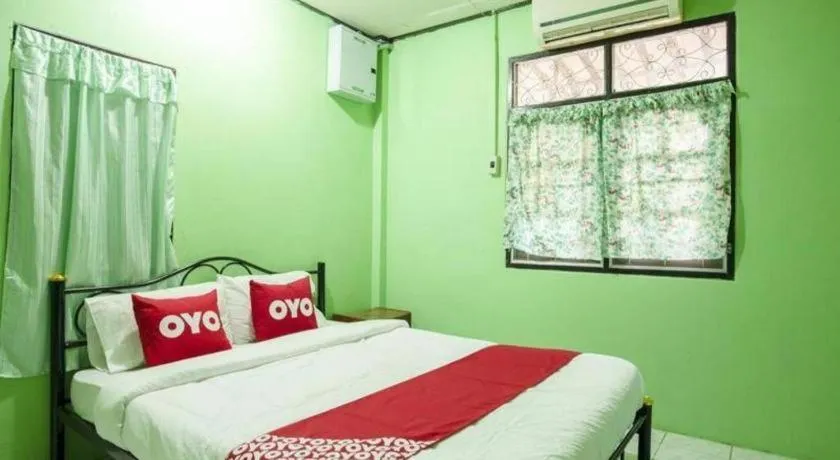 Bed in Raknatee Resort