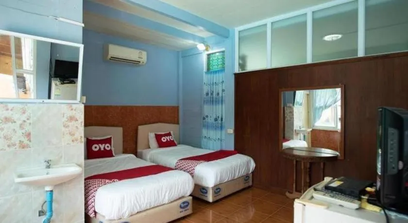 Bed in Raknatee Resort